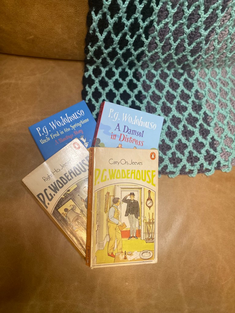 Four Wodehouse books: Uncle Fred in the Springtime, A Damsel in Distress, Right Ho, Jeeves; and Carry on, Jeeves. 